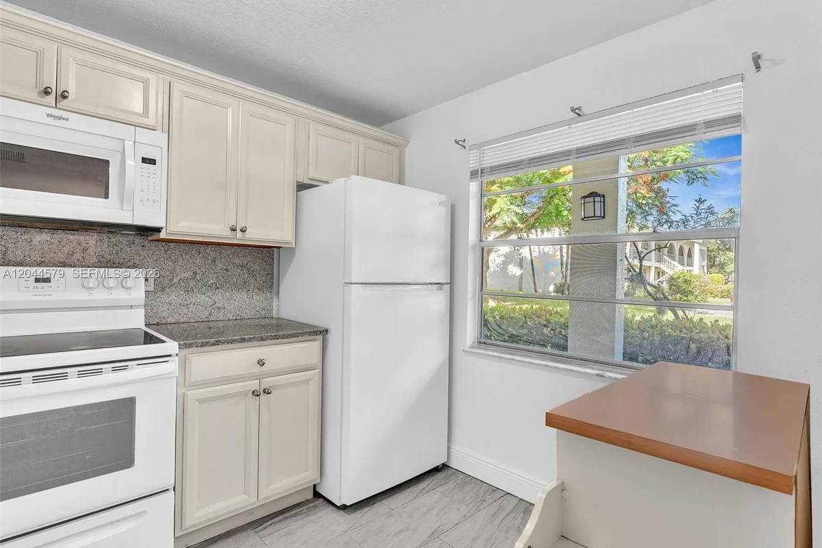 1212 SE Bahama Bend #G1, Coconut Creek: photo 1 of 80