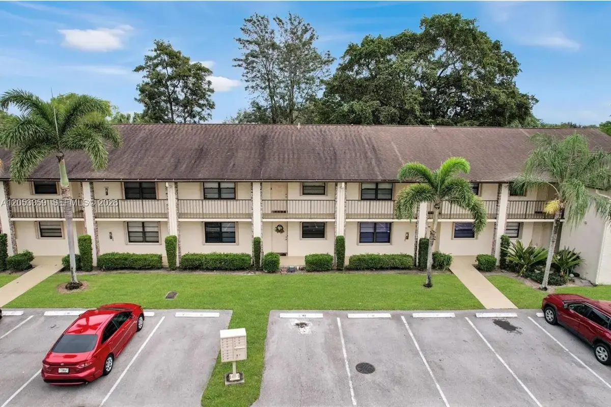23442 Lyons Rd #404, Boca Raton: photo 1 of 25
