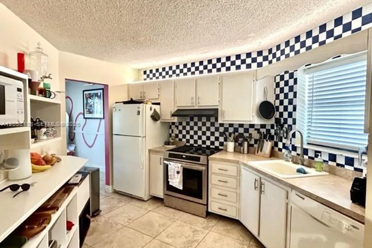 6555 W Broward Blvd #306, Plantation: photo 1 of 32