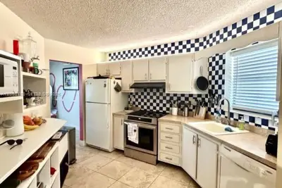 6555 W Broward Blvd #306, Plantation: photo 1 of 32