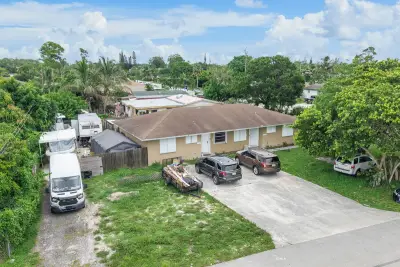 5735 Kumquat Rd, West Palm Beach: photo 1 of 35