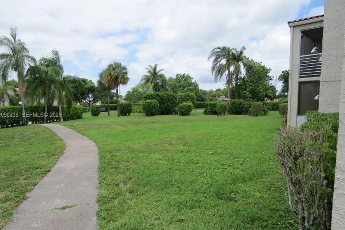 7435 Woodmont Ter #101, Tamarac: photo 1 of 13