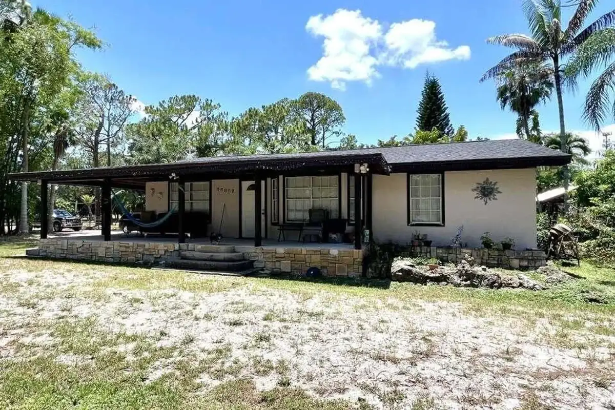 16887 W Trafalgar Dr W, The Acreage: photo 1 of 14