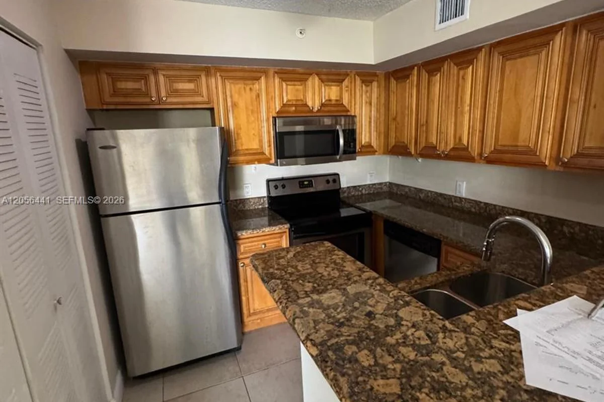 12142 St Andrews Pl #110, Miramar: photo 1 of 9