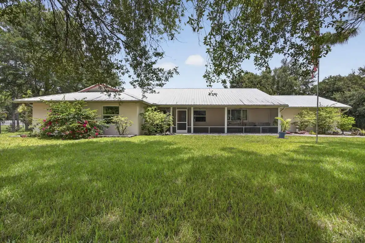 17183 73rd Ct N, The Acreage: photo 1 of 100