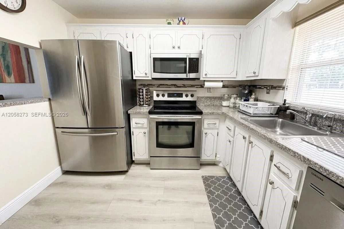 9801 Sunrise Lakes Blvd #203, Sunrise: photo 1 of 63