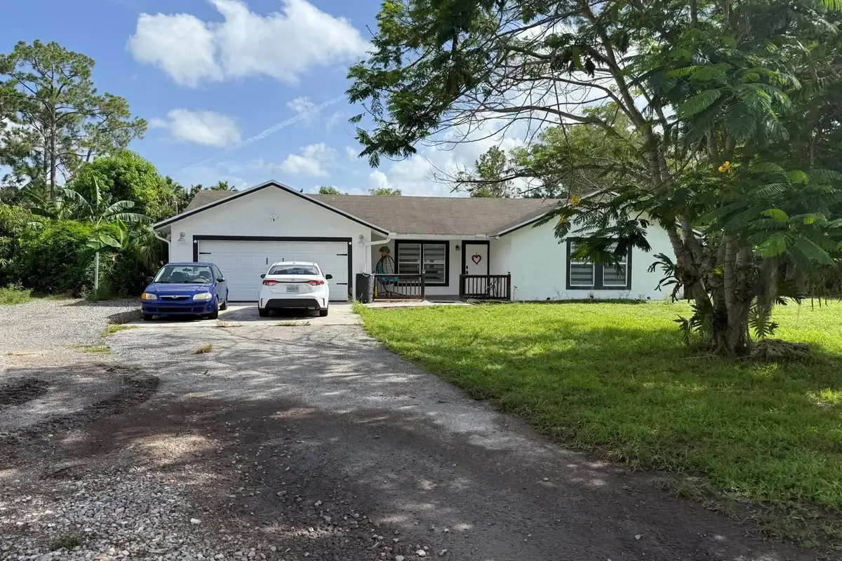 16393 E Lancashire Dr E, The Acreage: photo 1 of 24