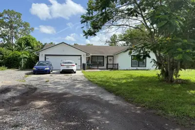 16393 E Lancashire Dr E, The Acreage: photo 1 of 24