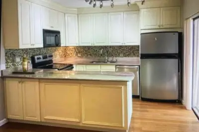 1700 Embassy Dr #105, West Palm Beach: photo 1 of 12