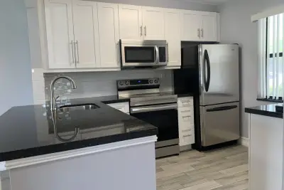 10011 Winding Lake Rd #101, Sunrise: photo 1 of 22