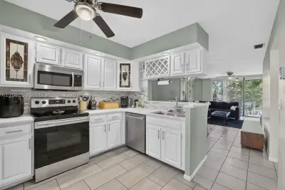 7653 NW 79th Ave #312, Tamarac: photo 1 of 43