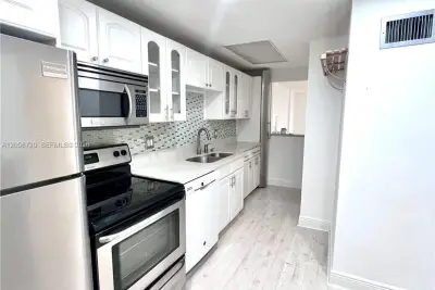 3660 NE 166th St #405, North Miami Beach: photo 1 of 11