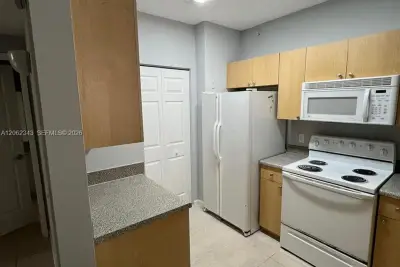 8020 N Nob Hill Rd #102, Tamarac: photo 1 of 9