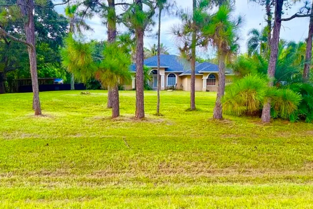 12377 77th Pl N, The Acreage: photo 1 of 20