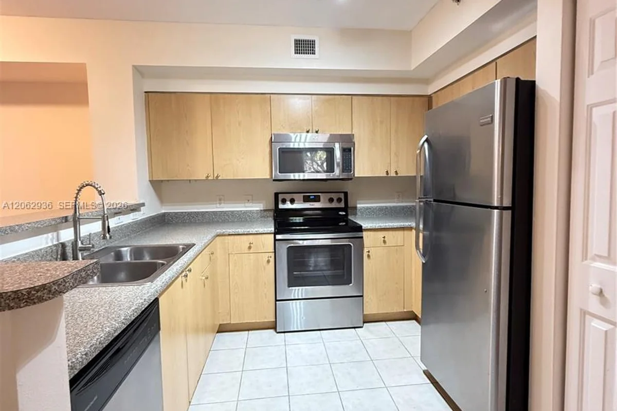 7940 N Nob Hill Rd #204, Tamarac: photo 1 of 11