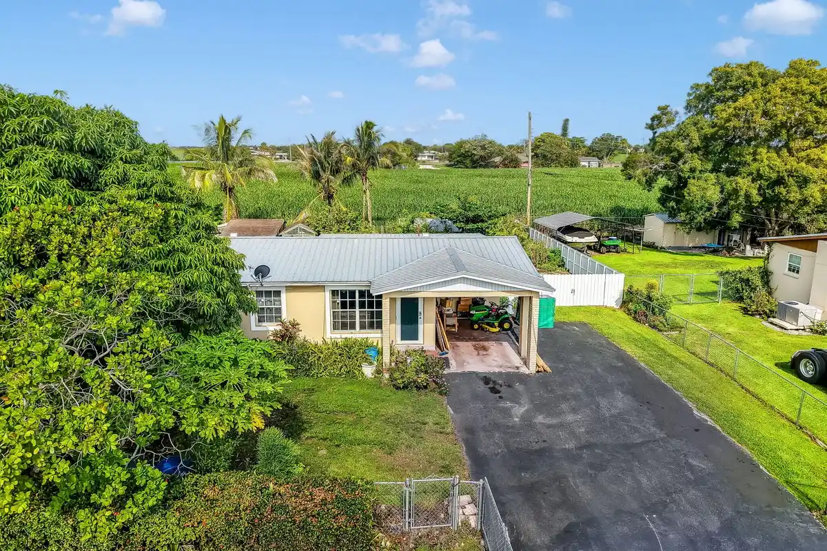 1048 Whitaker Rd, Belle Glade: photo 1 of 46