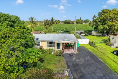 1048 Whitaker Rd, Belle Glade: photo 1 of 46