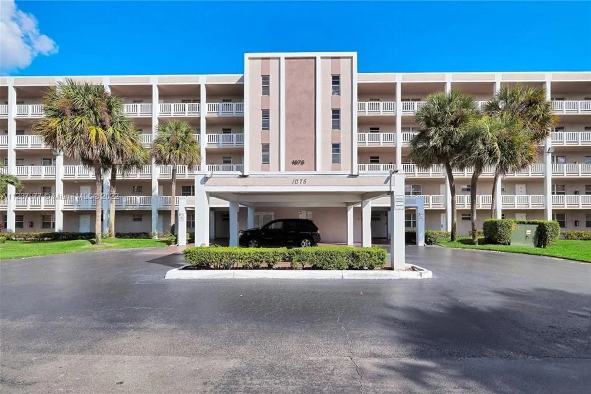 1075 Riverside Dr #303, Coral Springs: photo 1 of 23