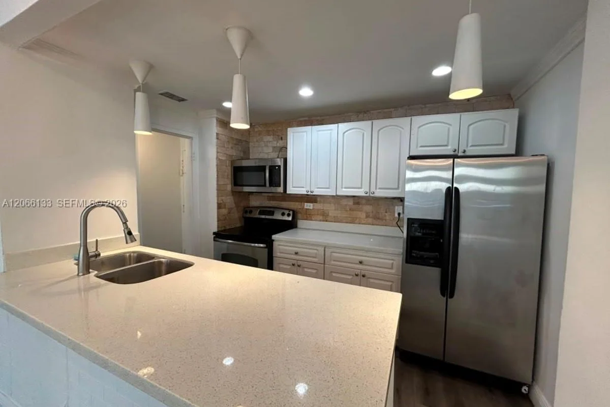 7545 E Treasure Dr #1B, North Bay Village: photo 1 of 26