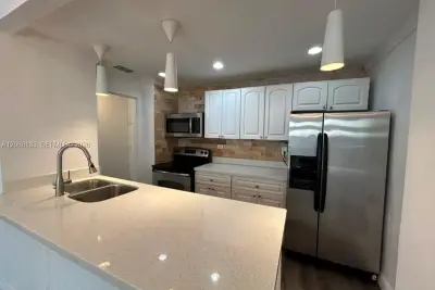 7545 E Treasure Dr #1B, North Bay Village: photo 1 of 26