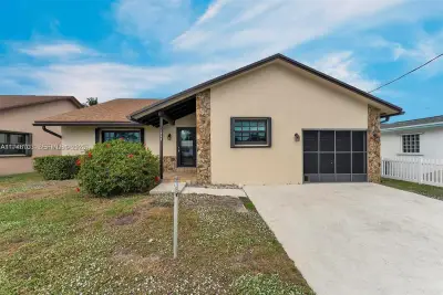 1406 NW 8th St, Dania Beach: photo 1 of 44