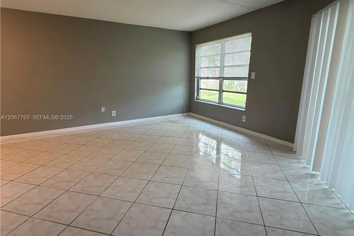 3100 Riverside Dr #104, Coral Springs: photo 1 of 25