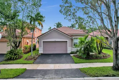938 Bluewood Ter, Weston: photo 1 of 65