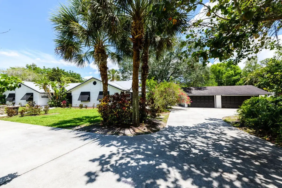12856 Arrowwood Dr, Palm Beach Gardens: photo 1 of 48