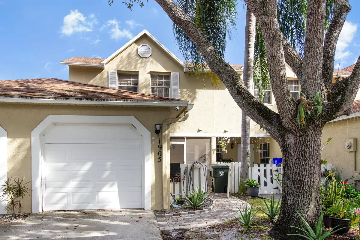1905 Maplewood Dr, Greenacres: photo 1 of 36