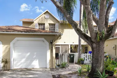 1905 Maplewood Dr, Greenacres: photo 1 of 36