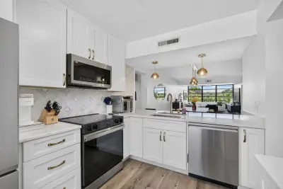 3635 Whitehall Dr #302, West Palm Beach: photo 1 of 57