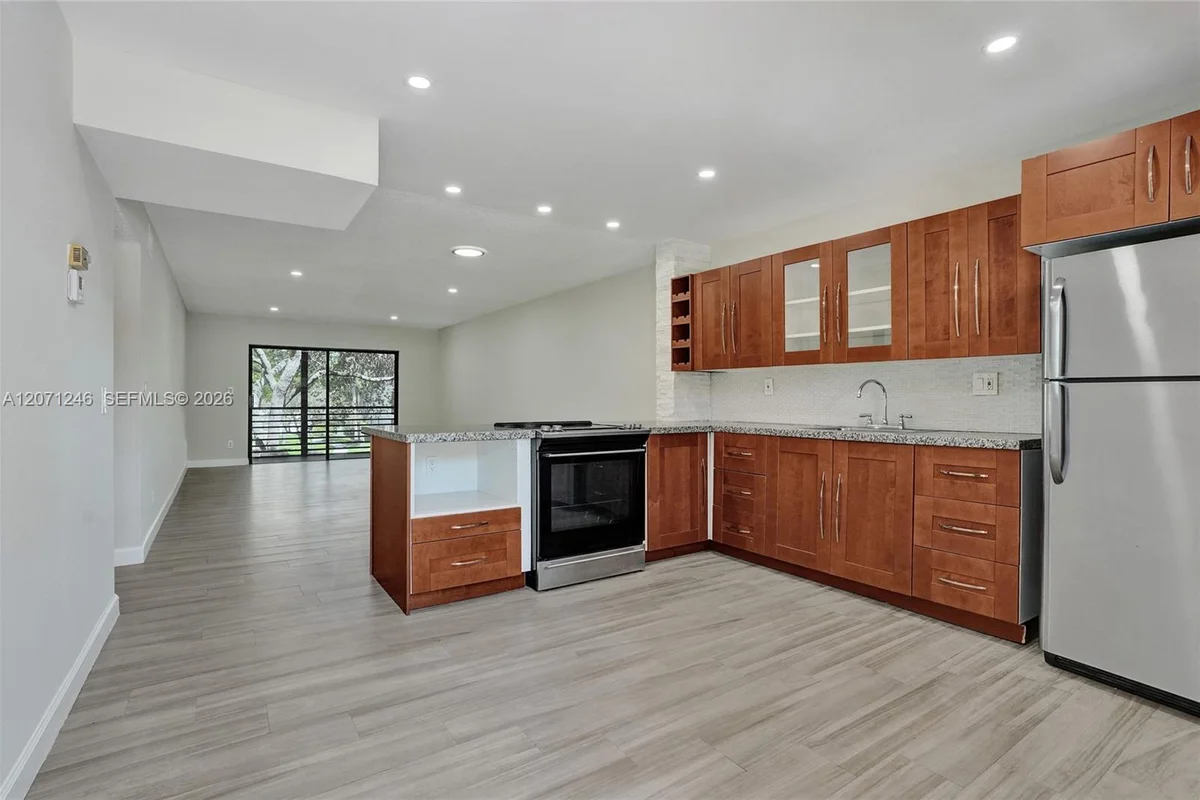 6090 N Sabal Palm Blvd #208, Tamarac: photo 1 of 57