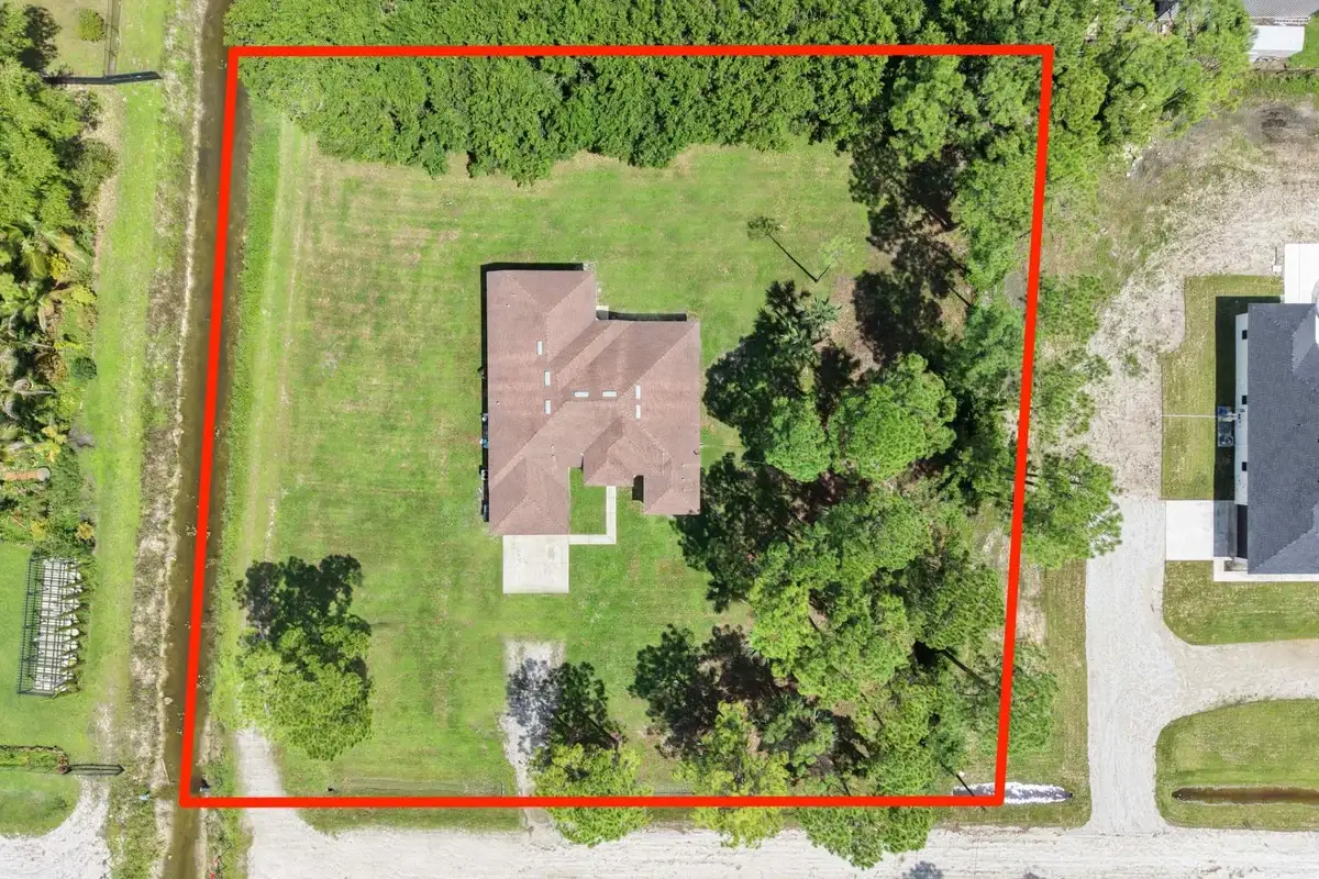 13753 78th Pl N, The Acreage: photo 1 of 52