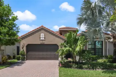 12025 Kalmar Cir N, Parkland: photo 1 of 38