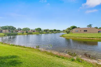 144 Lake Carol Dr, West Palm Beach: photo 1 of 26