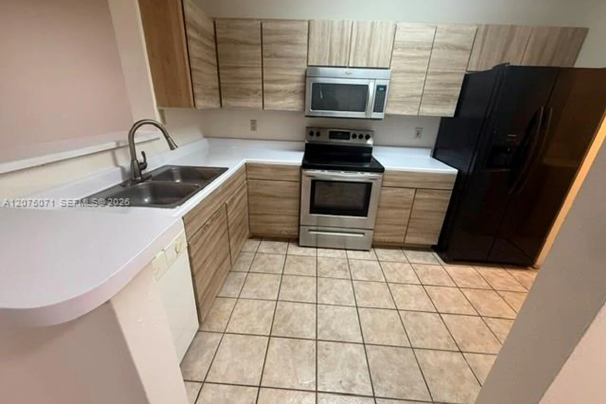 11229 W Atlantic Blvd #305, Coral Springs: photo 1 of 18