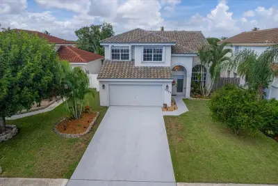7386 Michigan Isle Rd, Lake Worth: photo 1 of 59