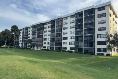 2430 Deer Creek Country Club Blvd #407-2, Deerfield Beach: photo 1 of 33