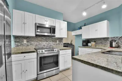 1419 Avon Ln #216, North Lauderdale: photo 1 of 34