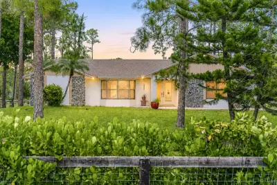 15211 60th Pl N, The Acreage: photo 1 of 72