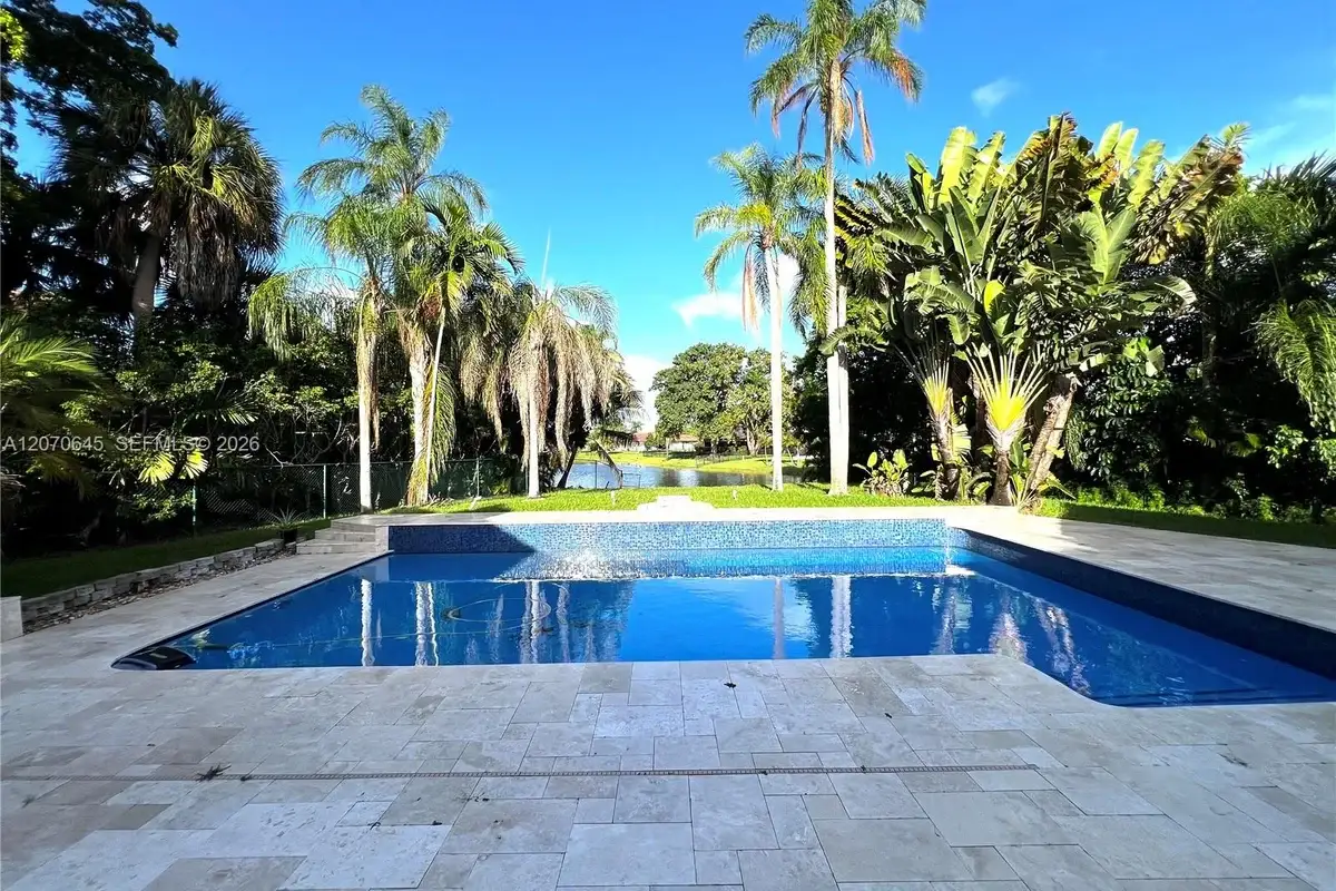 297 NW 104th Ave, Coral Springs: photo 1 of 40