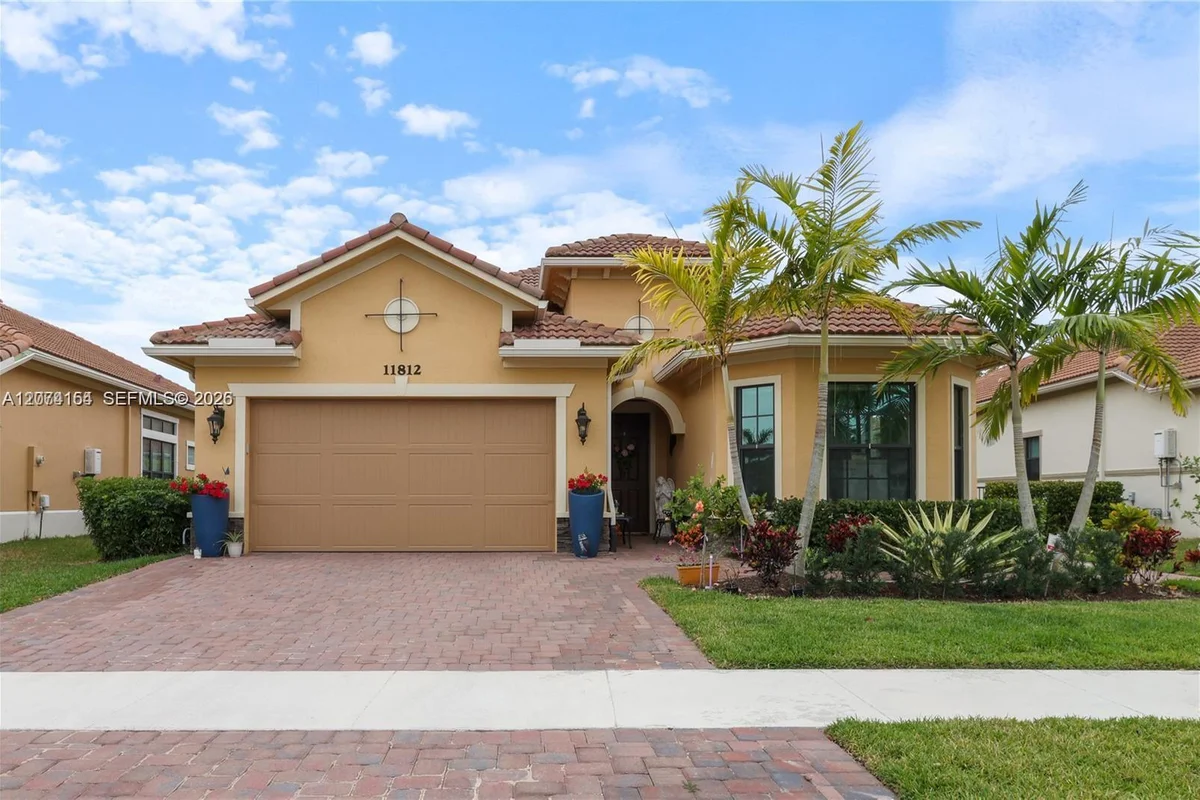 11812 S Cantal Cir S, Parkland: photo 1 of 30