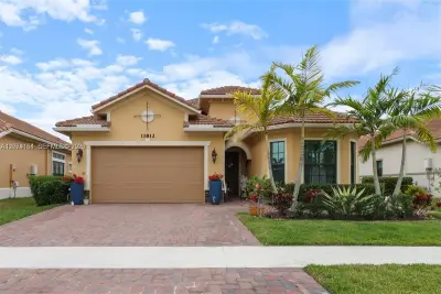 11812 S Cantal Cir S, Parkland: photo 1 of 30