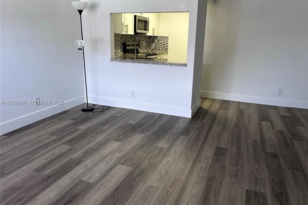 10049 Winding Lake Rd #103, Sunrise: photo 1 of 8