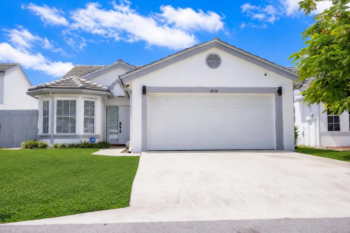 2974 Torrey Pine Ln, Lake Worth: photo 1 of 35