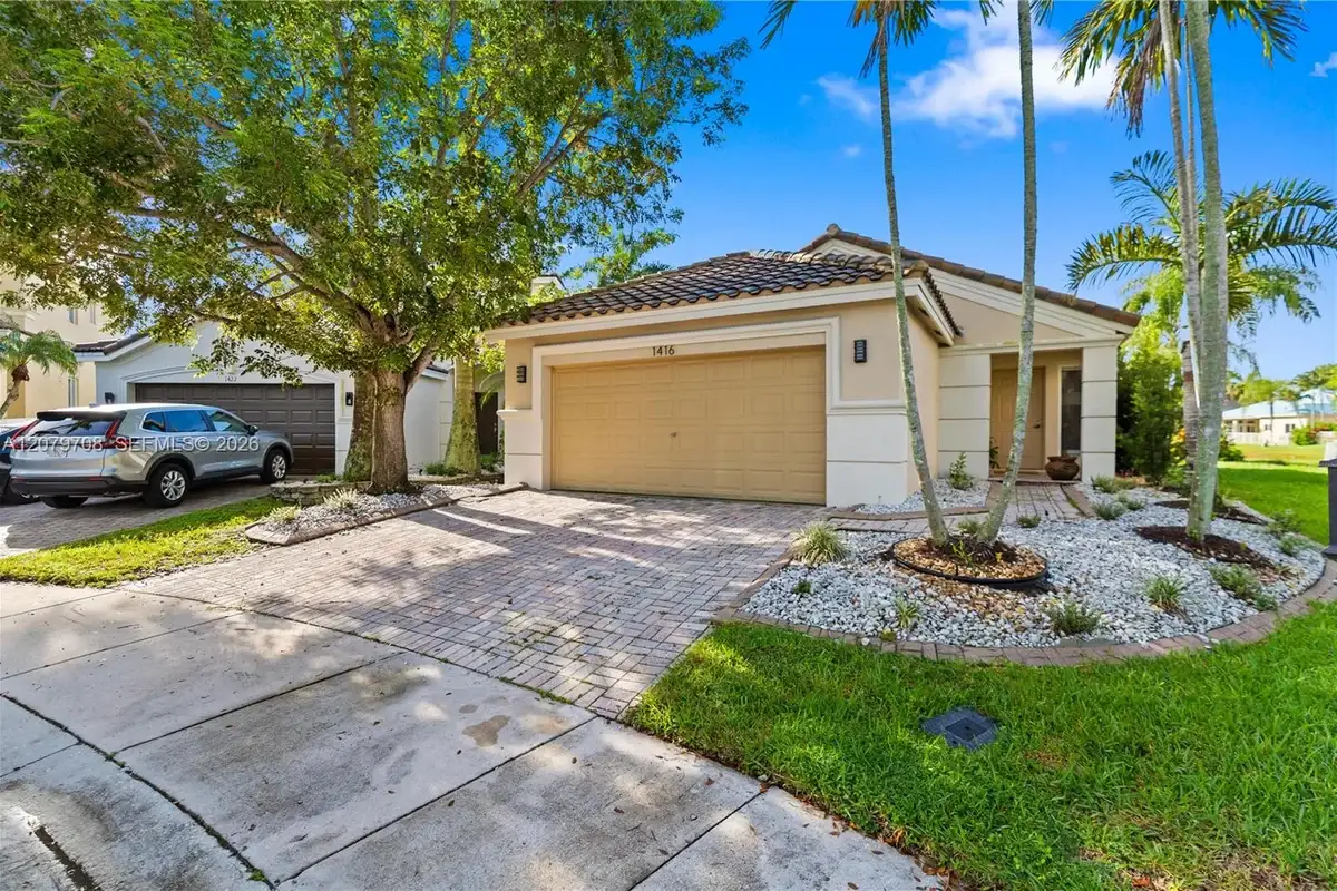 1416 Canary Island Dr, Weston: photo 1 of 45