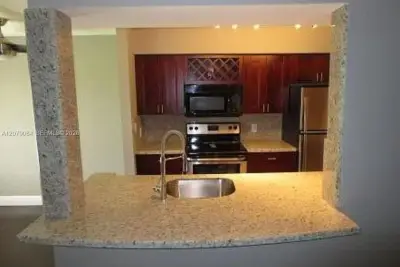 2405 NW 33rd St #1211, Oakland Park: photo 1 of 34