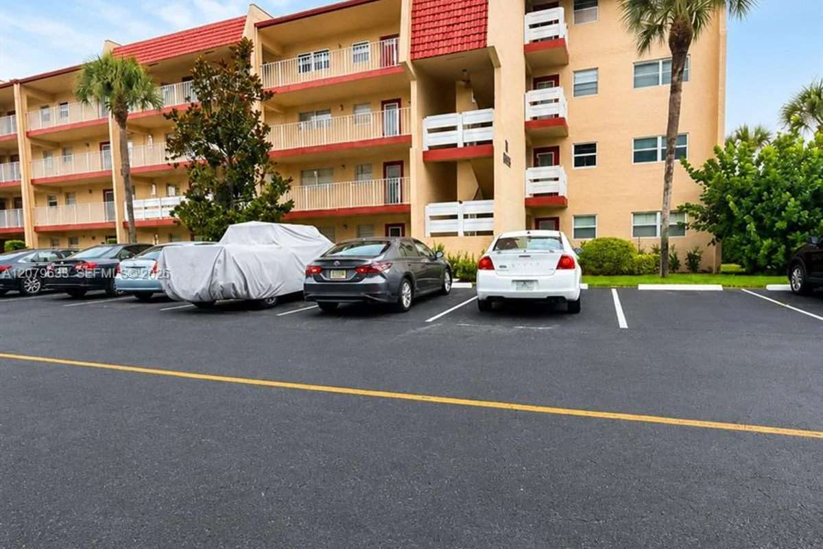 1035 Country Club Dr #408, Margate: photo 1 of 53