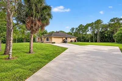 15664 89th Pl N, The Acreage: photo 1 of 24
