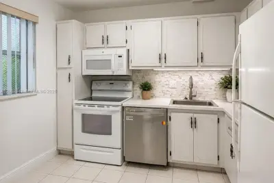 8350 Sands Point Blvd #E309, Tamarac: photo 1 of 25